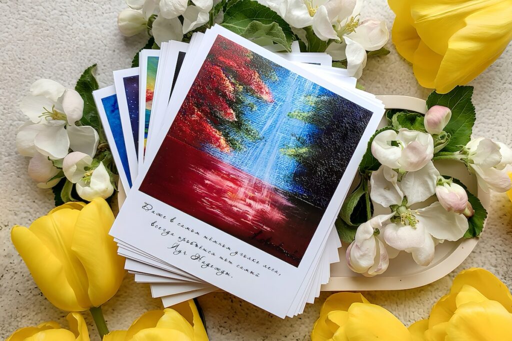 A tray of cards with yellow tulips and flowers for Christmas Cards.